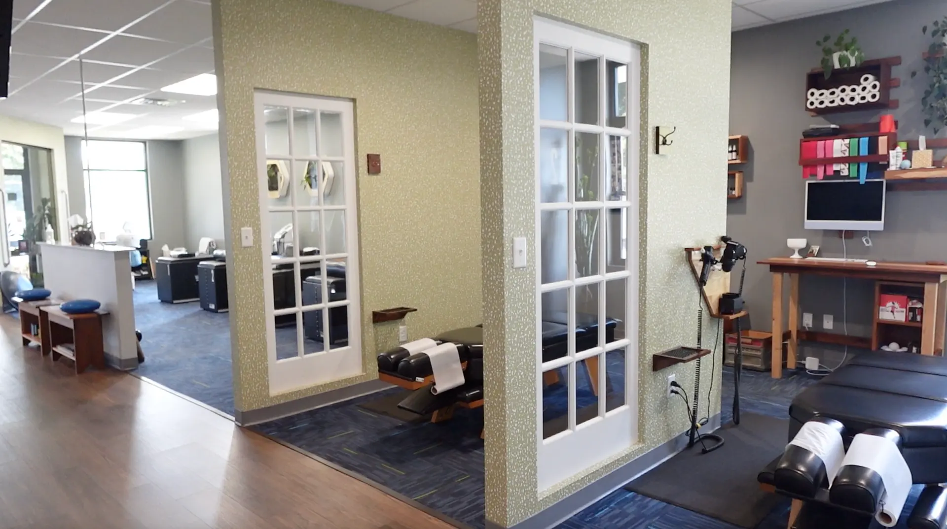 Bright, open chiropractic adjustment bays at Gateway Chiropractic in St. Louis, MO.